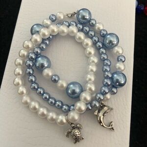 Swimming With Dolphins Trio